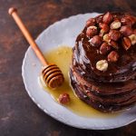 chocolate-pancake-with-honey-and-hazelnuts