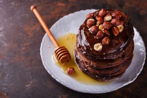 chocolate-pancake-with-honey-and-hazelnuts