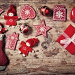 Christmas decorations on rustic wooden background