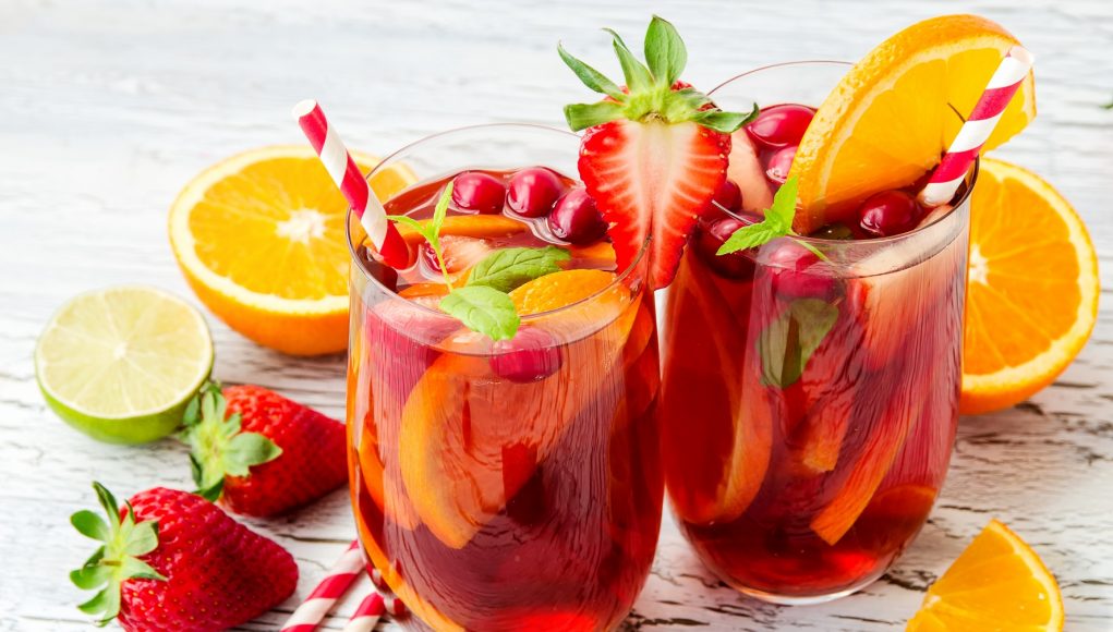 punch Cranberry drink, homemade lemonade or sangria with citrus fruits and berries