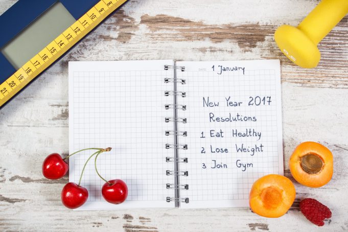 New year resolutions or goals in notebook