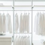 White apparels in built in white wardrobe