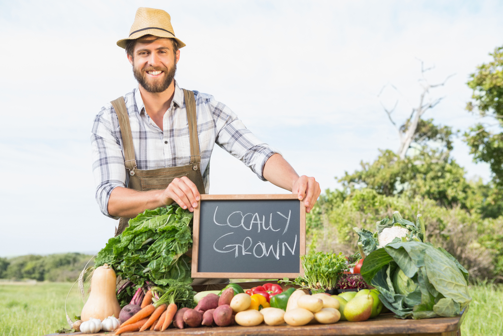 farmer-selling-his-organic-produce-on