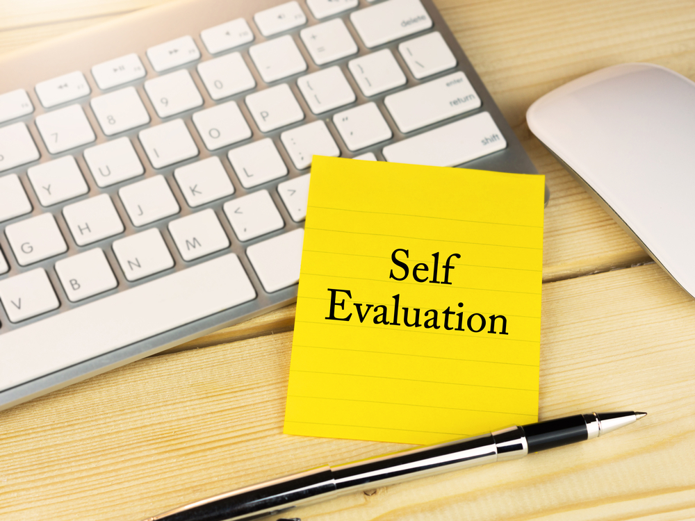 self-evaluation-on-sticky-note-work