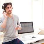 view-young-relaxed-man-listenning-music