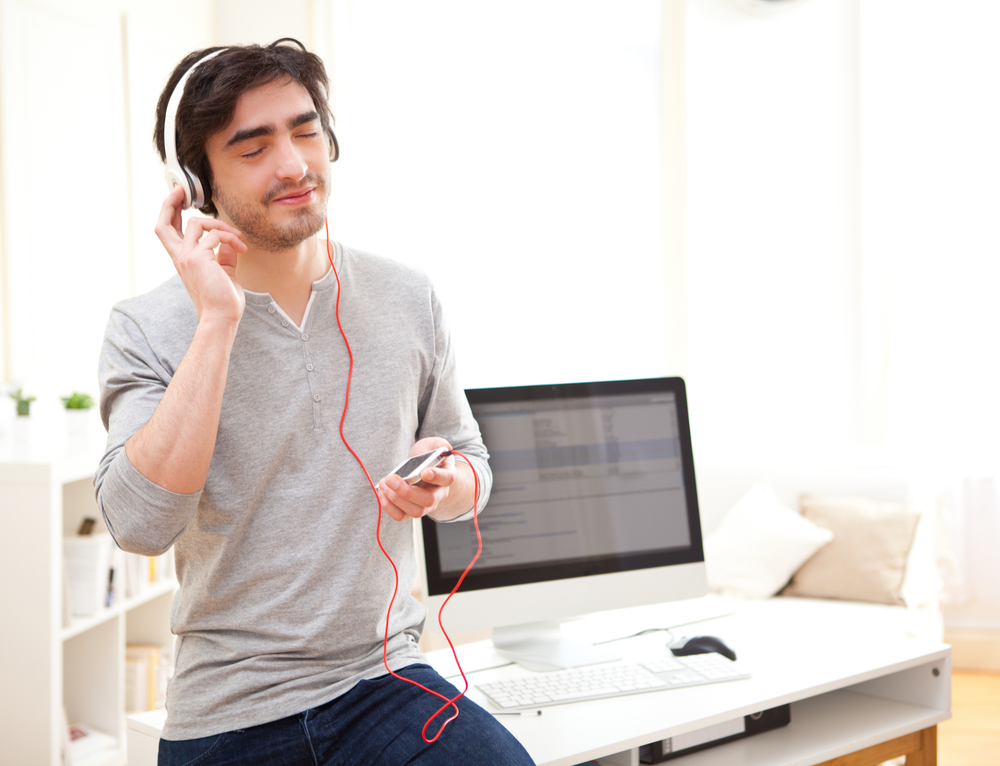 view-young-relaxed-man-listenning-music