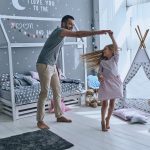 shutterstock_626378462_father_daughter_home_dancing