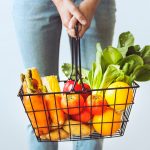 woman-holding-basket-vegetables-fruits