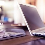 receipts-bills-laptop-finance